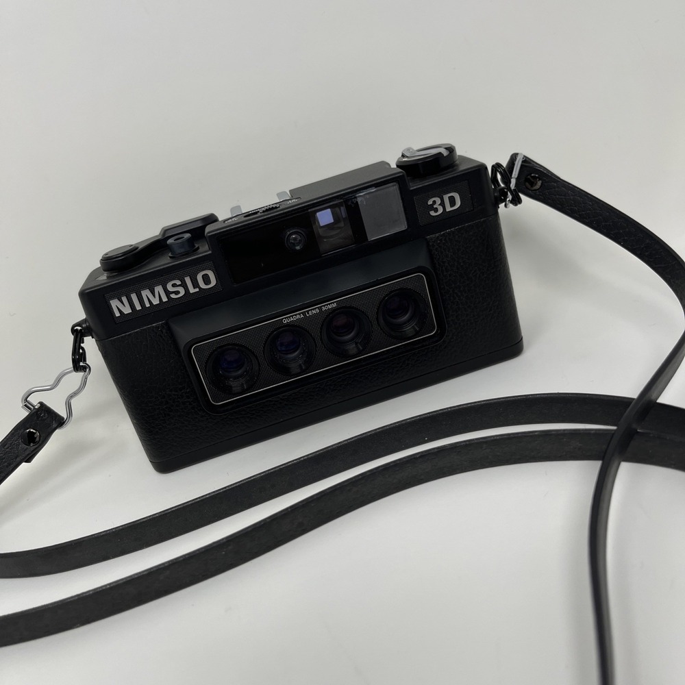 Nimslo 3D 35mm Stereo Film Camera Quadra Lens 30mm 4-Lens System Strap UNTESTED